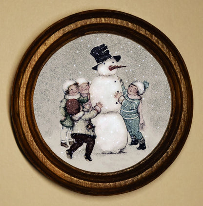 Snowman With Children Light Oak Round Wooden Framed Christmas Art Print 2.5"x2.5"