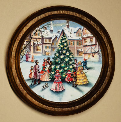 Carol Singing Around A Christmas Tree Light Oak Round Wooden Framed Christmas Art Print 2.5"x2.5"